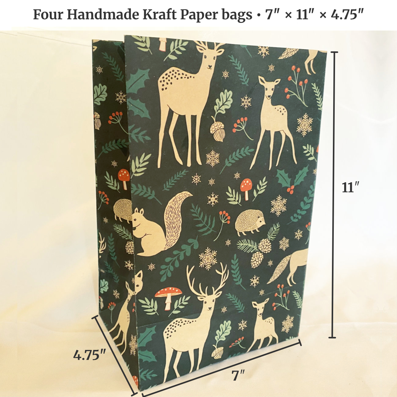 Handmade bag in the Woodland Creatures paper measuring 7 inches wide by 11 inches high by 4.75 inches deep.
